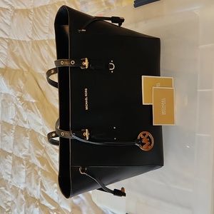 Michael Kors leather bag with padded tablet sleeve
